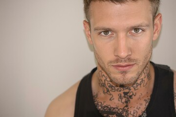 Fototapeta premium Stylish Male Portrait in Casual Tank Top