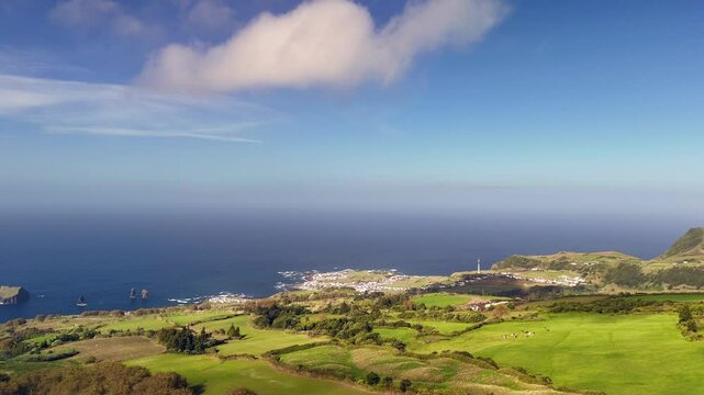 Mosteiros, Azores from a bird's-eye view. The Atlantic Ocean, with its powerful waves crashing against the rugged coastline.
A black sand beach and cliffs, formed from solidified lava, stand as a tes