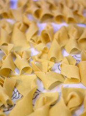 Angel wings (Faworki), cakes. Raw sweet pastry prepared for deep fried