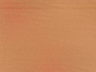 Subtle peach-toned abstract background with soft texture.