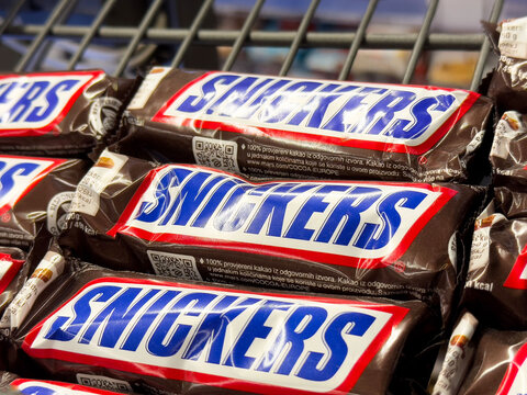 Snickers bars on store shelf chocolate candy display