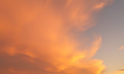 Obraz premium Warm gradient of gold, amber, and peach tones, resembling a glowing sunset sky