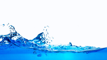 Closeup view of dynamic flowing blue water waves on white background. Liquid splash. Texture and abstract background
