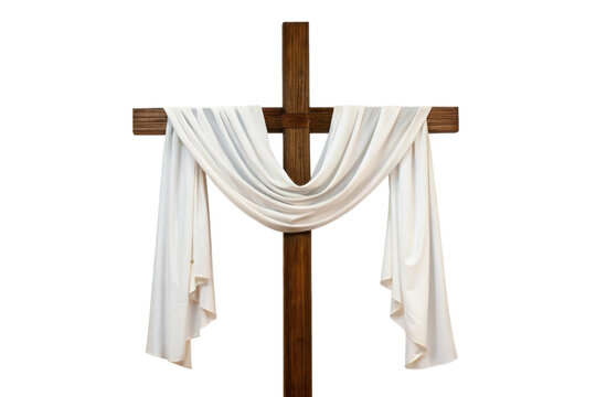 White draped fabric on wooden cross for worship, cut out