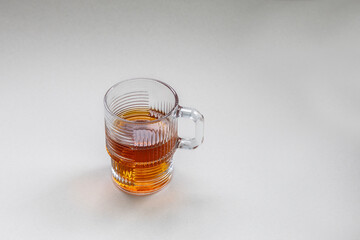 Tea in a glass on a white background with copy space