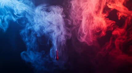 Fototapeta premium Abstract red and blue smoke swirling in a dark atmosphere