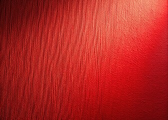 Fototapeta premium Red textured paper wall, photographed in low light.