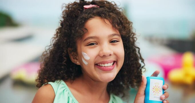 Face, smile and sunscreen with girl child outdoor at pool in garden of home for product marketing. Advertising, bottle and uv protection with happy kid in backyard to promote spf cream for summer