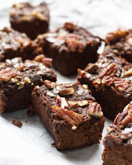 Vegan brownie with pecans, chocolate and peanut butter