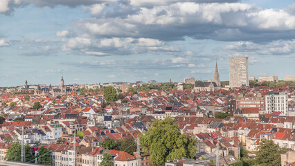 Fototapeta premium Aerial timelapse panorama over Brussels skyline in Schaerbeek with Saint-Servais Church and Town Hall