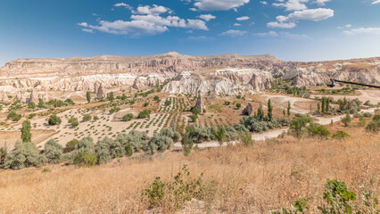 Red Valley and Rose Valley of Goreme of Nevsehir in Cappadocia aerial timelapse, Turkey.