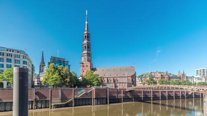 Naklejka premium Hyperlapse of Hauptkirche St. Katharinen or St. Catherine's Church in Hamburg, Germany.