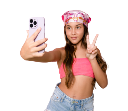 Photo portrait of little latin girl with long brunette hair smiling keeping smartphone isolated on transparent background. PNG transparent