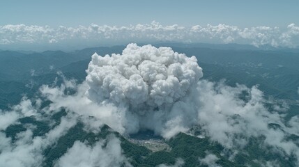 Volcanic eruption plume over mountain range