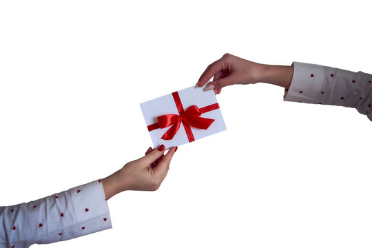 a gift certificate in red and white colors in female hands isolated; png;