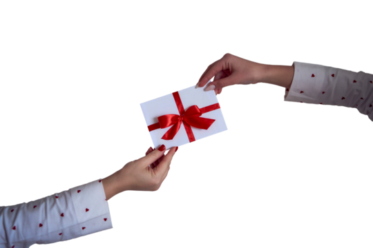 a gift certificate in red and white colors in female hands isolated; png;