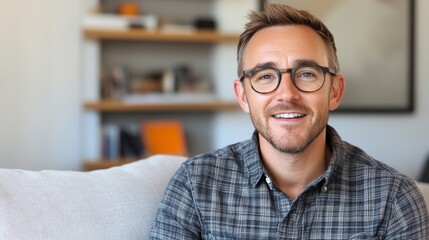 Smiling Young Man Exuding Confidence and Approachability. Grey Scale Casual Portrait.