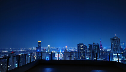 City skyline view at night with illuminated buildings, starry night sky