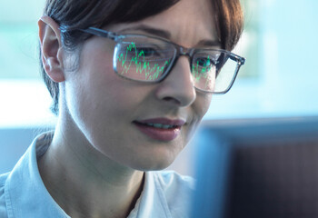 Business women viewing a graph showing company performance