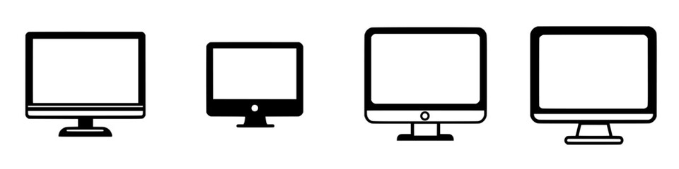 Different types of computer monitors arranged in a row showing variations in design and size