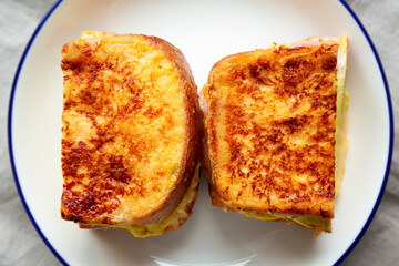 Homemade French Monte Cristo Sandwich with Raspberry Jam, Blank Notepad, top view. Flat lay, overhead.