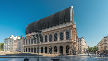 Fototapeta premium Hyperlapse of Lyon's opera house featuring neoclassical architecture combined with a modern glass dome roof. France