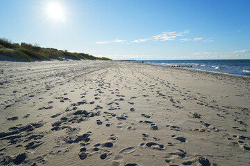 Footsteps in the sand beach at the baltic sea, west poland