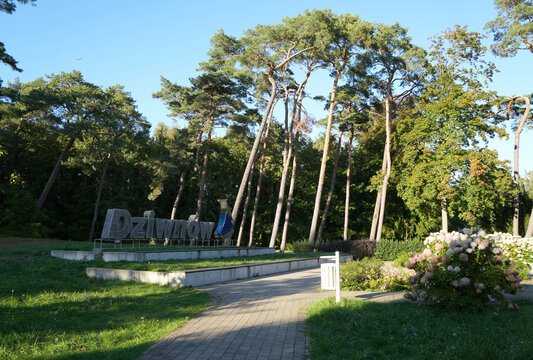 Dziwnow, Poland, town sign made of stones in a public park near the baltic sea