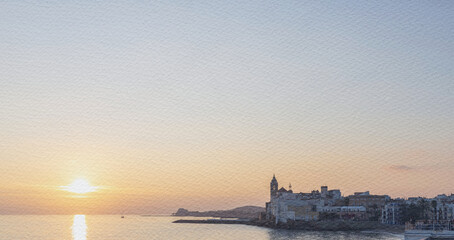 Beautiful sunset over the ocean with a small town in the background