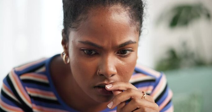 Anxiety, habit or worry and woman in living room of home with coping mechanism for stress or tension. Psychology, trauma and thinking with nervous person biting nails as symptom of impatience