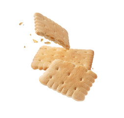 Whole and cracked crispy cookies in the air close-up on a white background