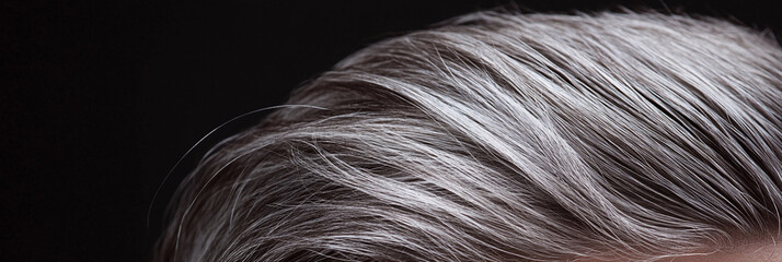 Elegant gray hair styled with sleek precision