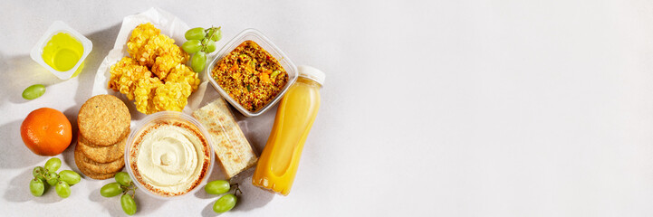 Premade gluten free supermarket ready meal top view. Quick food to eat on the go for lunch break, web banner, copy space