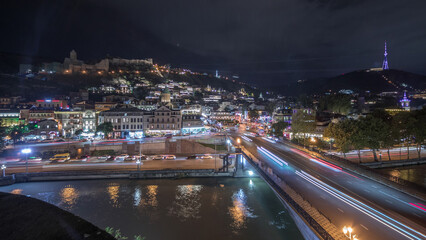 Colorful traditional houses panorama with wooden carved balconies in the Old Town of Tbilisi aerial timelapse, Georgia.