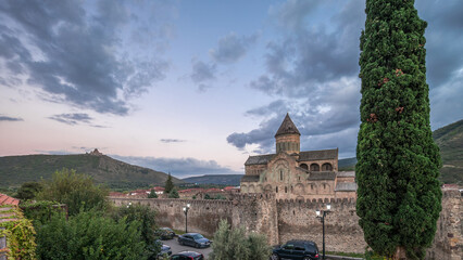 Fototapeta premium The Svetitskhoveli Cathedral aerial day to night timelapse. Mtskheta, Georgia