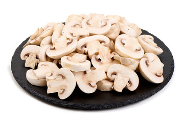 Sliced champignons, close-up, isolated on white background