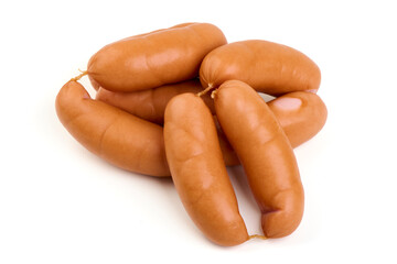 Heap of cooked sausages, close-up, isolated on white background.