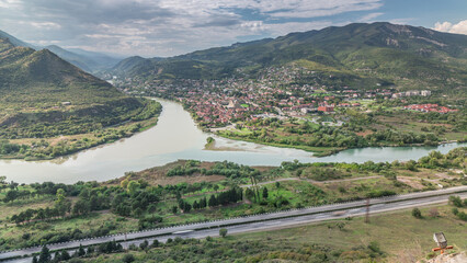 Aerial view of the merger of two rivers Kura or Mtkvari and Aragvi into one timelapse. Georgia © HyperlapsePro