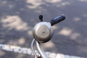 Old bicycle bell for roadster bike. Vintage bicycle bell.