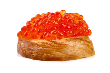 Red caviar on a crispy bread slice, isolated on white background.