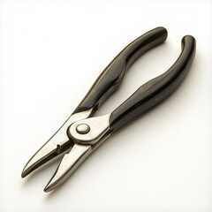 Obraz premium Black-handled pliers with metal jaws rest diagonally on a stark white surface, casting subtle shadows.