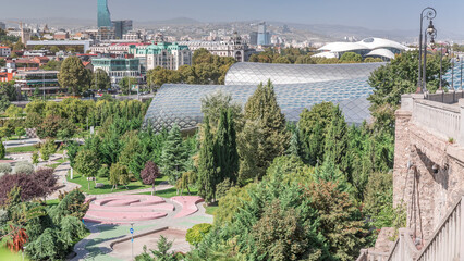 The Musical Theatre and the Exhibition Hall located inside the Rhike Park in Tbilisi aerial timelapse © HyperlapsePro