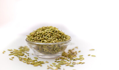 dry fennel seed sounf isolated on white background. pile of dry fennel seeds sounf isolated. heap of dry fennel seeds sounf isolated food closeup in bowl.