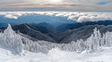 Obraz premium Majestic Snowy Mountain Landscape Under Dramatic Cloudy Sky