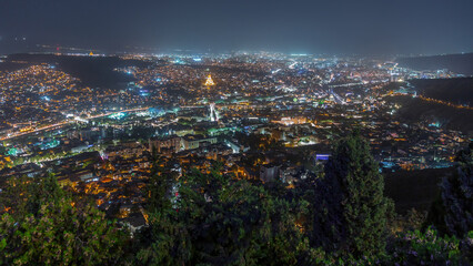 Tbilisi cityscape, Georgia day to night aerial timelapse. Top view over the city center and Kura river in Tbilisi. © HyperlapsePro