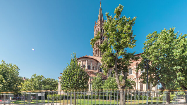 The cobbled parvis of the Basilica of Saint Sernin in Toulouse, France, timelapse hyperlapse.