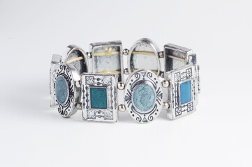 Silver stretch bracelet with blue enamel and silver beads.