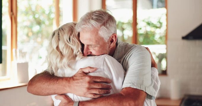 Love, senior couple and hug for care, romance and connection on valentines day in home. Retirement, man and woman embrace together for relationship, commitment and marriage anniversary with soulmate