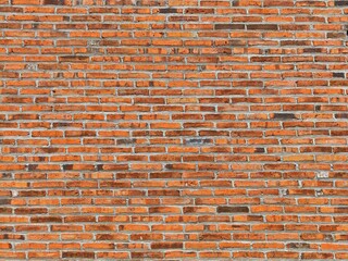 The smooth texture of a classic red brick wall. Perfect for backdrops, cladding, and design projects.