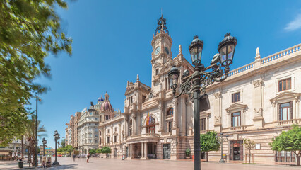Obraz premium Valencia City Hall or Ajuntament de Valencia timelapse hyperlapse in Plaza de Ayuntamiento. Spain